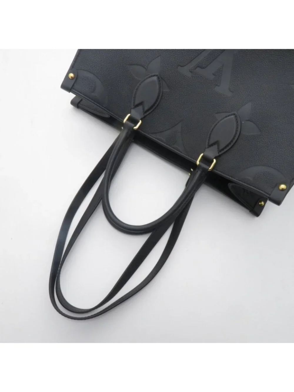 Louis Vuitton on the Go MM Monogram Empreinte Noir Tote Tag Stamp